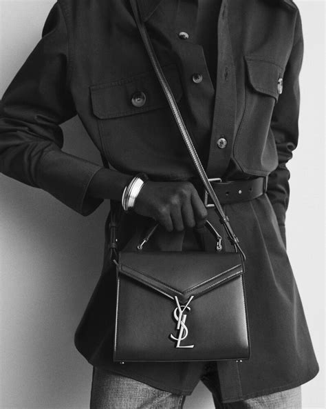 ysl cassandra mini suede|Cassandra mini top handle bag in smooth leather and suede.